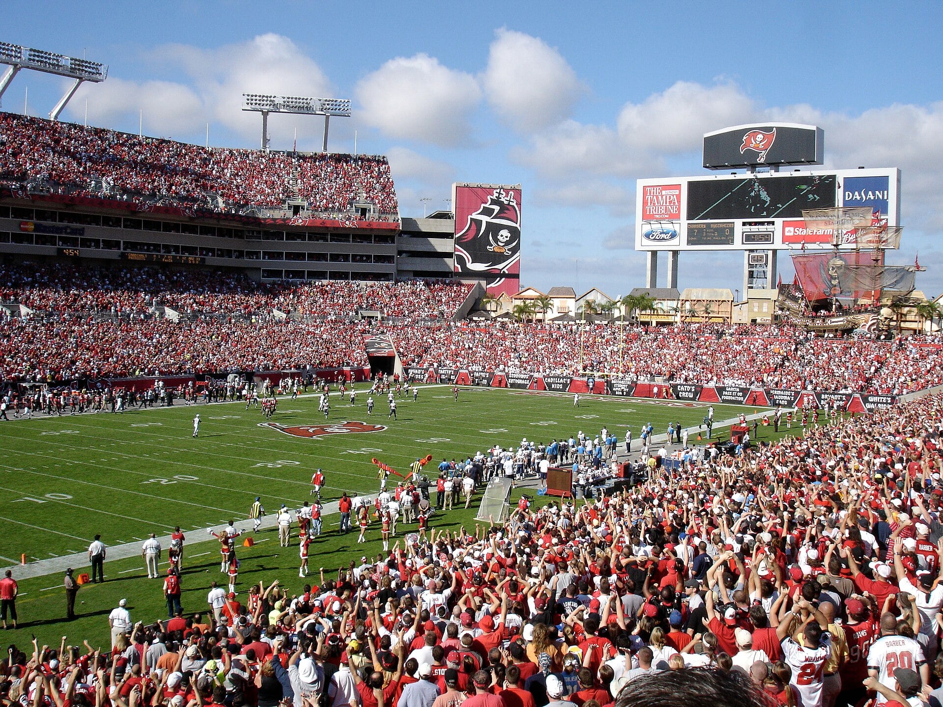 Exterior of Raymond James Stadium in Tampa, home of the Buccaneers, photographed in 2008 by Wikimedia contributor AHeneen.