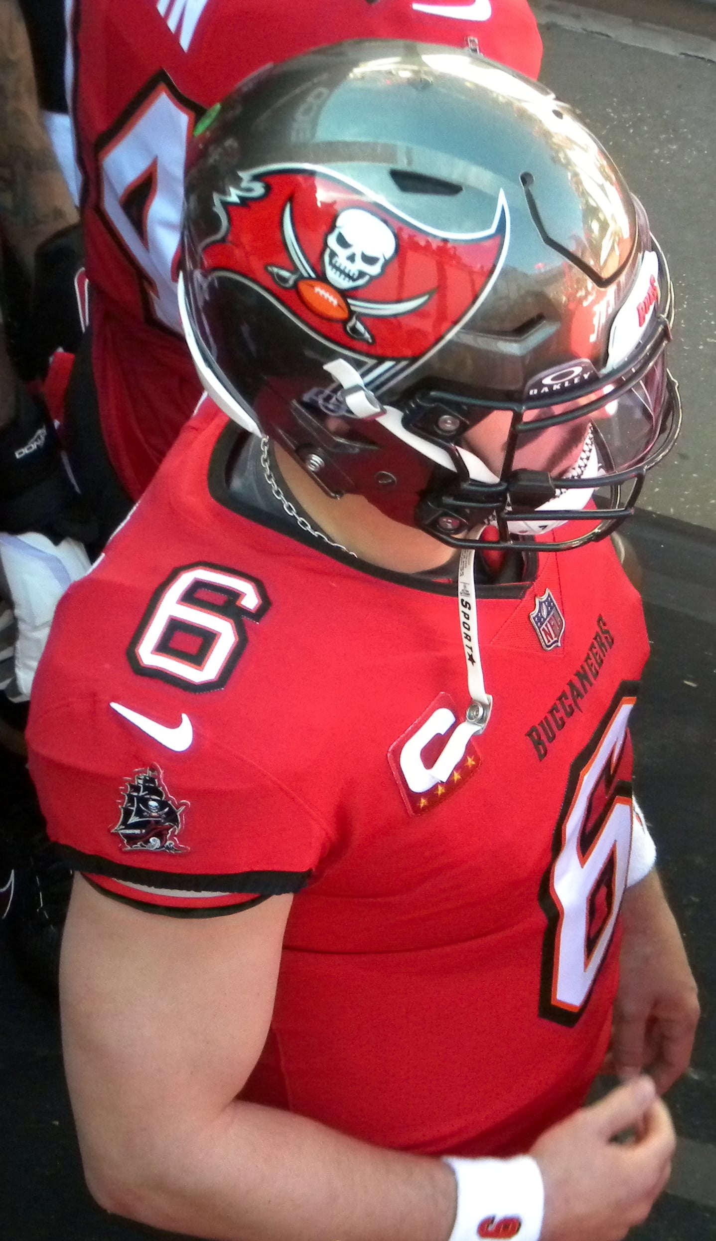 Baker Mayfield wearing a Tampa Bay Buccaneers uniform and helmet during a game on December 31, 2023.